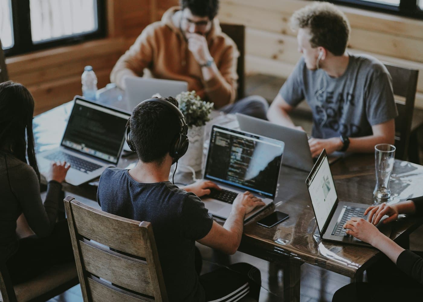 A team working together on laptops